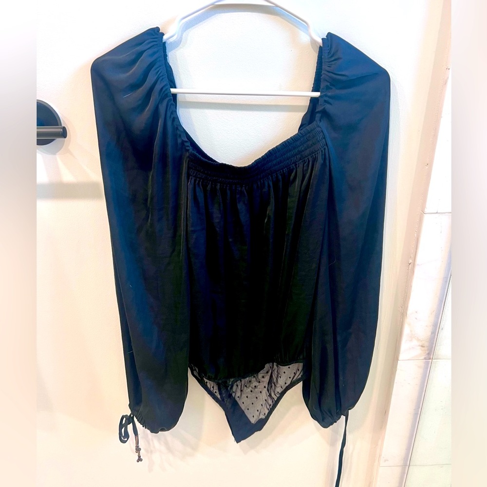 Free people long sleeve bodysuit! Super cute. Great condition